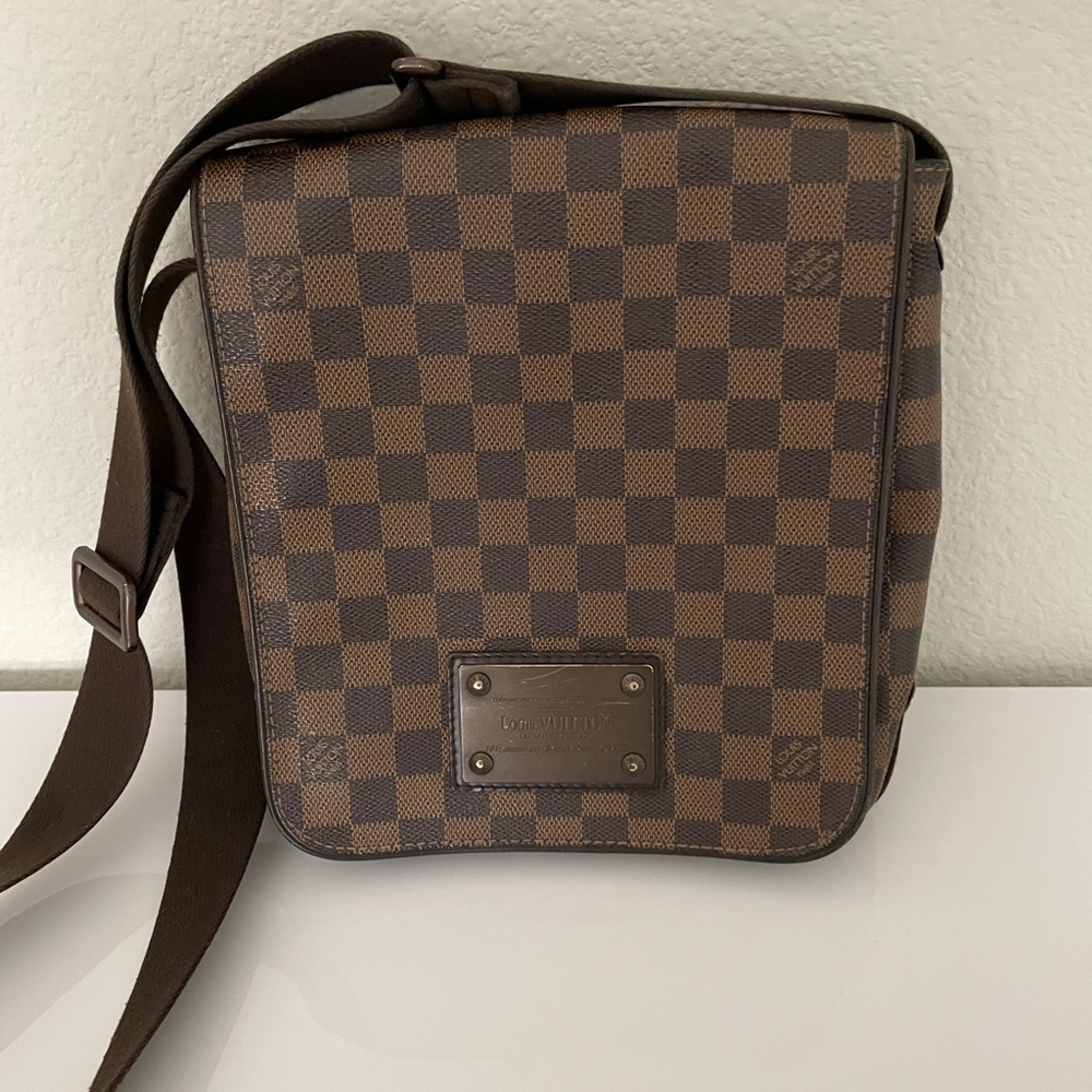 Authentic Louis Vuitton Ebene cross body bag.